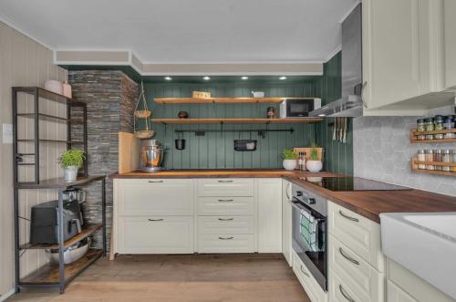 Η κουζίνα ή μικρή κουζίνα στο Big 2 Floors apartment, Perfect location and View