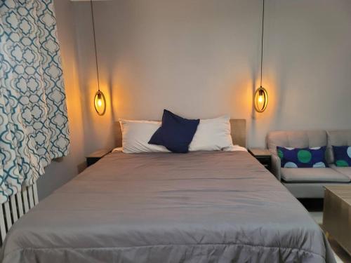 Ένα ή περισσότερα κρεβάτια σε δωμάτιο στο Cozy Stay Studio
