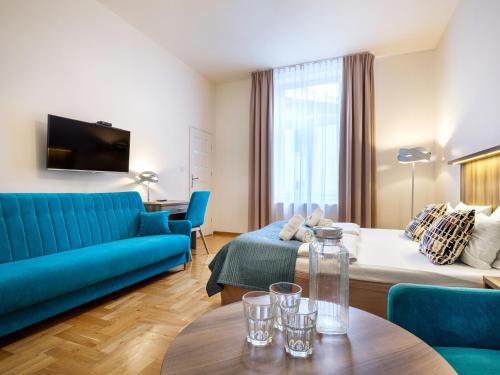 TV a/nebo společenská místnost v ubytování Kosmopolita Apartments