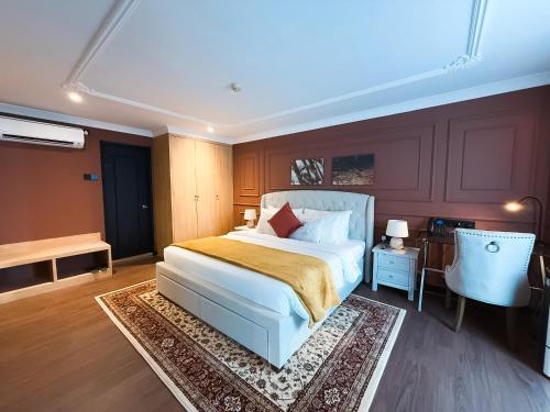 Ένα ή περισσότερα κρεβάτια σε δωμάτιο στο Wyndham Garden Shahzan Fraser's Hill