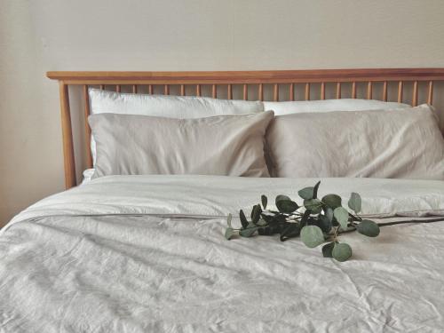 Ένα ή περισσότερα κρεβάτια σε δωμάτιο στο Cozy Modern Studio at Shin-Bundang Line