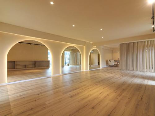 a large room with a wooden floor and white walls at DC Ghencea 158 Self Check-in in Bucharest