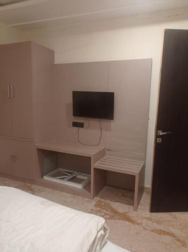 TV a/nebo společenská místnost v ubytování Hotel Highway Crown