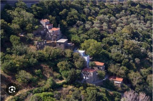 an aerial view of a house on a hill at Paradisi Village in Neapolis