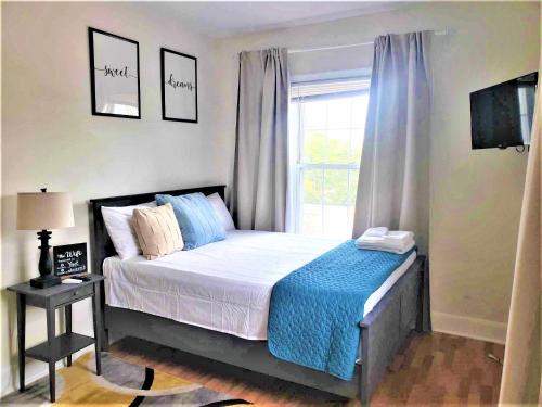 Ένα ή περισσότερα κρεβάτια σε δωμάτιο στο Pleasant Private Room in Washington DC