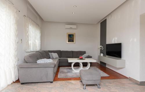 a living room with a couch and a table at Villa Ante - Makarska by Villas Guide in Gornja Glavina