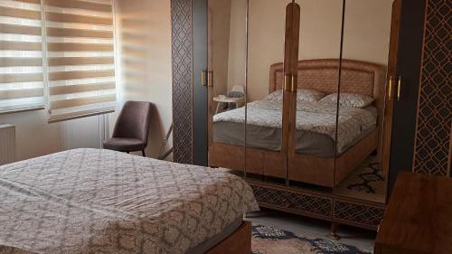 Ένα ή περισσότερα κρεβάτια σε δωμάτιο στο Complete Apartment in Etiler Beşiktaş