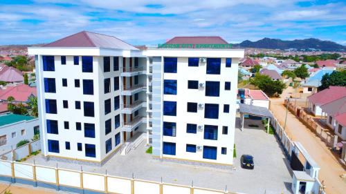 an overhead view of a white apartment building at Eastern City Apartments in Dodoma