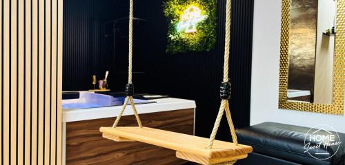 a swing in a room with a sink at Luxury Loft Home Sweet House in Oupeye