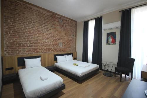 Katil atau katil-katil dalam bilik di TAXIM 34 Hotel İstanbul