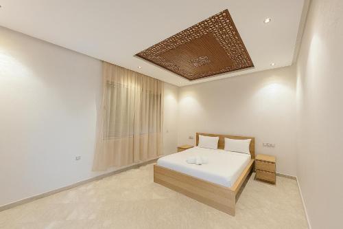 Ένα ή περισσότερα κρεβάτια σε δωμάτιο στο Villa Pearl De Marrakech