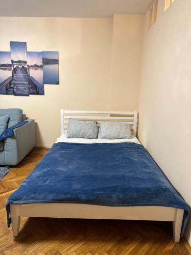 Una cama o camas en una habitación de Arena Apartmani