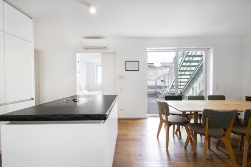 Dapur atau dapur kecil di Nadland Apartment Wehlistrasse