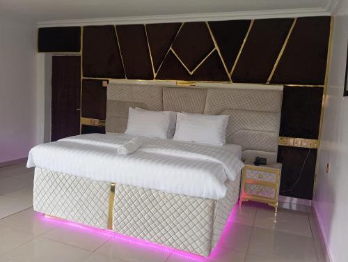 Postel nebo postele na pokoji v ubytování Jaspino Hotel