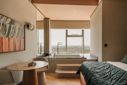 Postel nebo postele na pokoji v ubytování Apartamenty Sky Tower