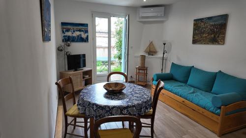 Et opholdsområde på Le Gabian, duplex proche plage et centre