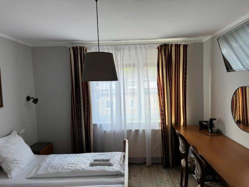 Letto o letti in una camera di Asiatisches Landhaus Pension