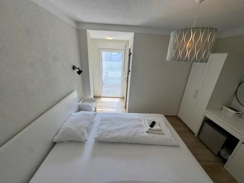 Letto o letti in una camera di Asiatisches Landhaus Pension
