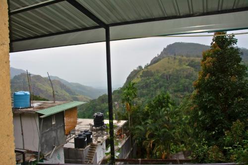 a view of the mountains from a house at Secret View Homestay Ella in Ella