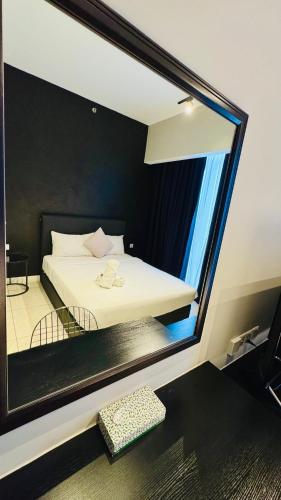 Un ou plusieurs lits dans un hébergement de l'établissement Axon Residence KL Bukit Bintang