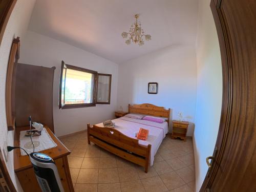 Ένα ή περισσότερα κρεβάτια σε δωμάτιο στο Villa Grazia