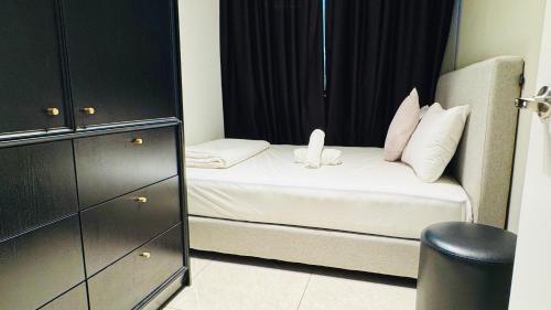 Un ou plusieurs lits dans un hébergement de l'établissement Axon Residence KL Bukit Bintang