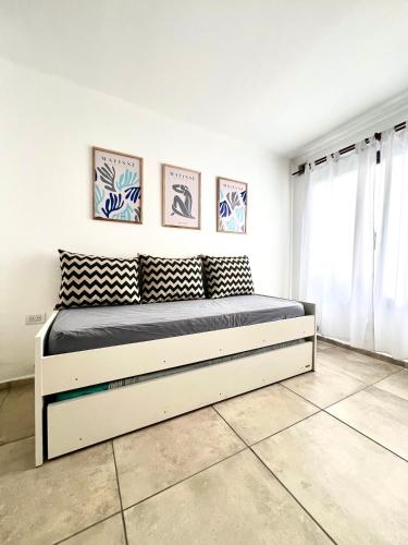 a bedroom with a large bed in a room at FINCA NOVA Apartment 7 in Balcarce