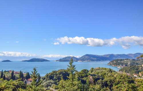 a view of a large body of water with mountains at 3 Bedroom Stunning Home In Montemarcello in Monte Marcello