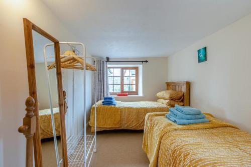 Ένα ή περισσότερα κρεβάτια σε δωμάτιο στο 3 Bed in Ashwater oc-l32597