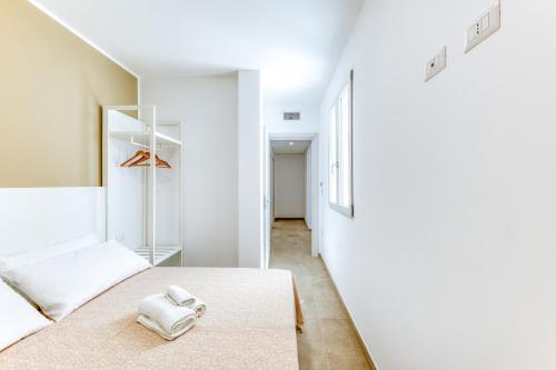 Postel nebo postele na pokoji v ubytování Residence Fronte Mare