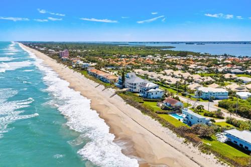 an aerial view of a beach with houses at 5435 Highway A1A in Melbourne Beach