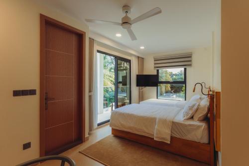 Cama o camas de una habitación en Aire Dharavandhoo