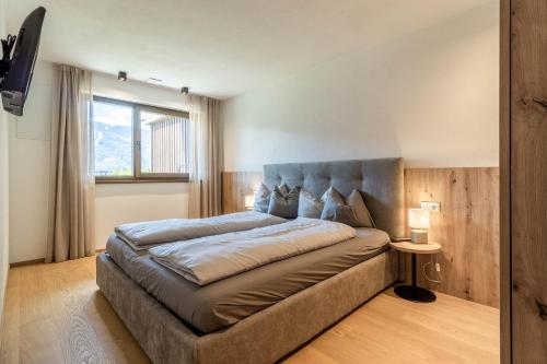 Postel nebo postele na pokoji v ubytování Proventus Apartments