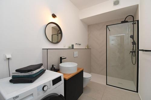 Ένα μπάνιο στο Apartament MALIN