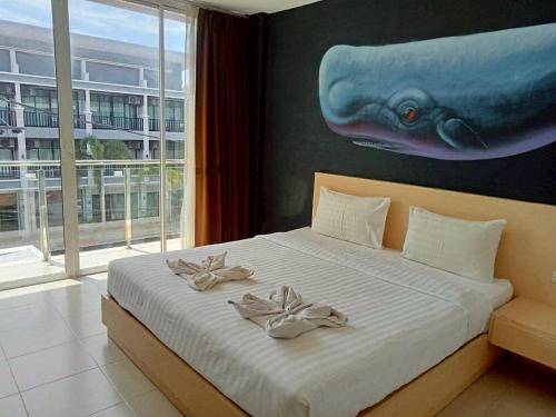 Katil atau katil-katil dalam bilik di GO Inn Krabi Aonang Beach - โกอินน์ อ่าวนาง