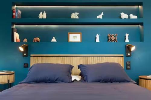 Ένα ή περισσότερα κρεβάτια σε δωμάτιο στο La Motte Bleue