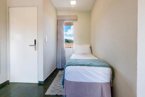 Postel nebo postele na pokoji v ubytování Filimahalo Hotel