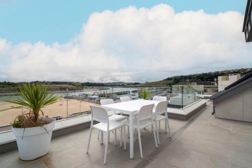 Balkón nebo terasa v ubytování Alojamientos Turísticos Puerto de Suances junto a la playa, terraza y garaje privado