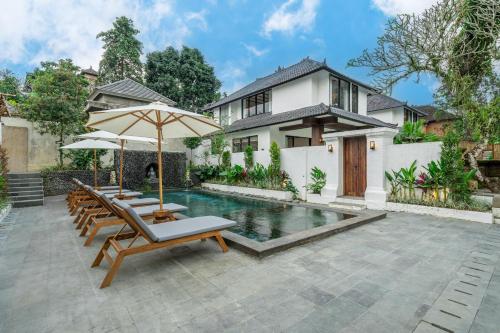 Πισίνα στο ή κοντά στο Sacred Jungle by EVDEkimi - Stylish Jungle Retreat with Apartments & Villas with Kitchens, Pools and Concierge Service in Ubud