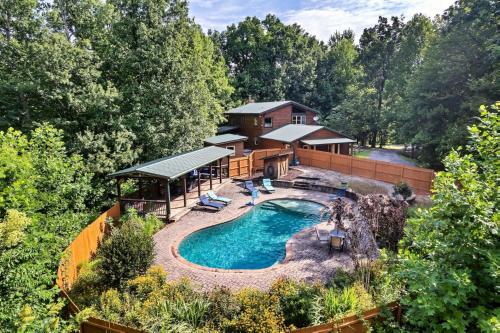 an aerial view of a house with a pool at Eagles Perch Pool Cabin in Rocky Grove