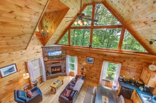 an overhead view of a living room in a log cabin at All Time High in Cartertown