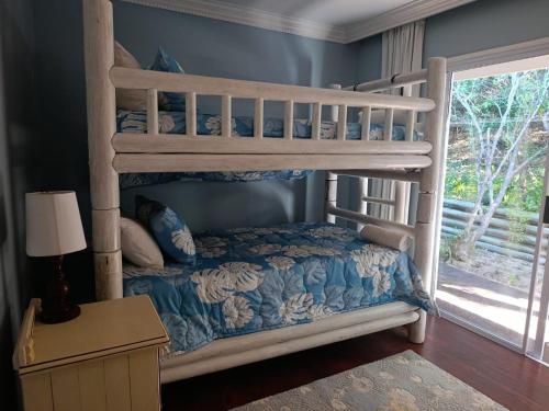 a childs bunk bed in a room with a window at Santa Vista 1 in Santa Maria
