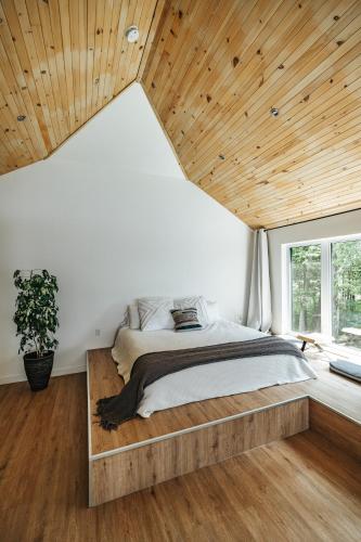 Katil atau katil-katil dalam bilik di Unic lofts - Ligali - Massif Charlevoix, Mont-St-Anne