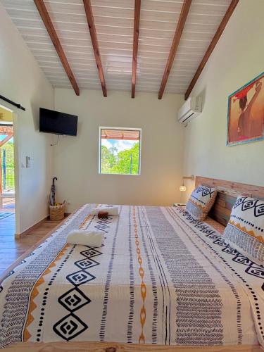 Ένα ή περισσότερα κρεβάτια σε δωμάτιο στο Ti-Kaz Gwada