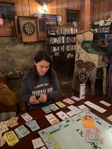 a woman sitting at a table in a book store at Rancho Grande in Ojai