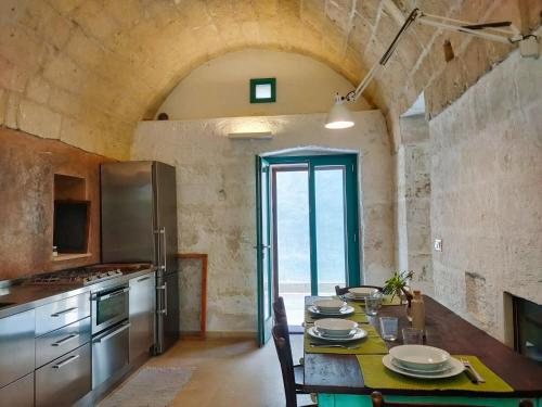 Una cocina o cocineta en Doma Camilla di Casa Camilla Journey
