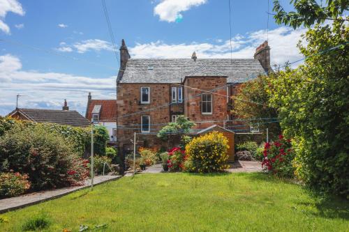 En have udenfor The Wee Harbour Home