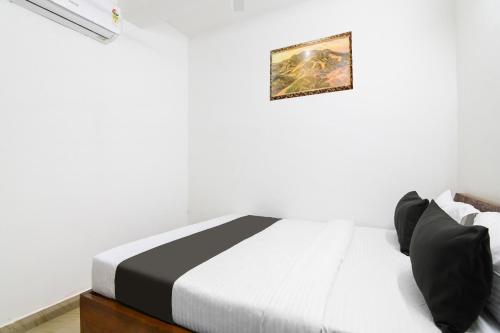 Postel nebo postele na pokoji v ubytování HOTEL O SP