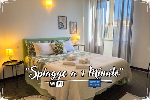 a bedroom with a large bed with the words squeeze a mimic at Beaches 1 min away - Free WiFi - Smart TV - AC in Albisola Superiore