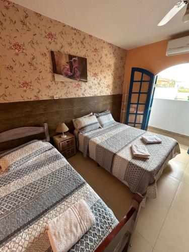 En eller flere senge i et værelse på Villa Di Verona Charm Hotel